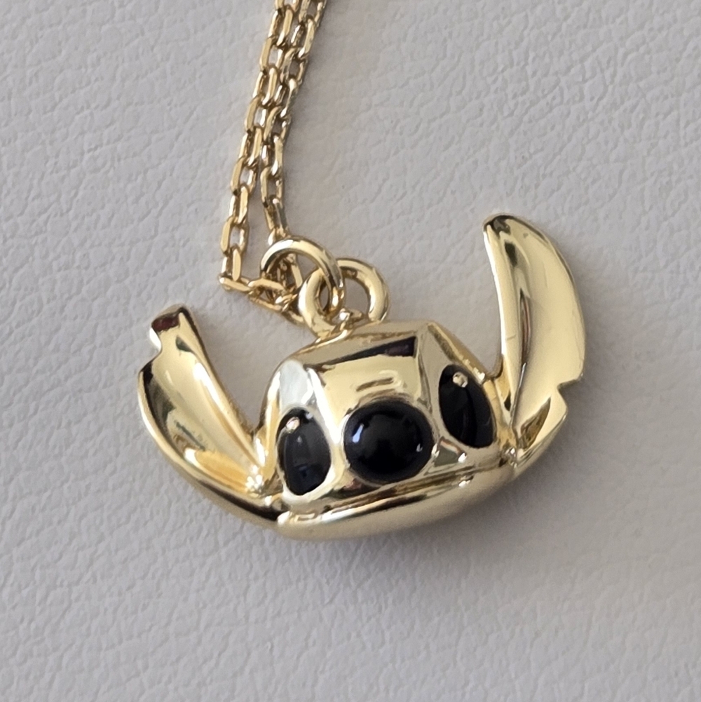 Stitch Gold-Tone Necklace with Hibiscus Flower & Crystal Accents - Picture 4 of 11